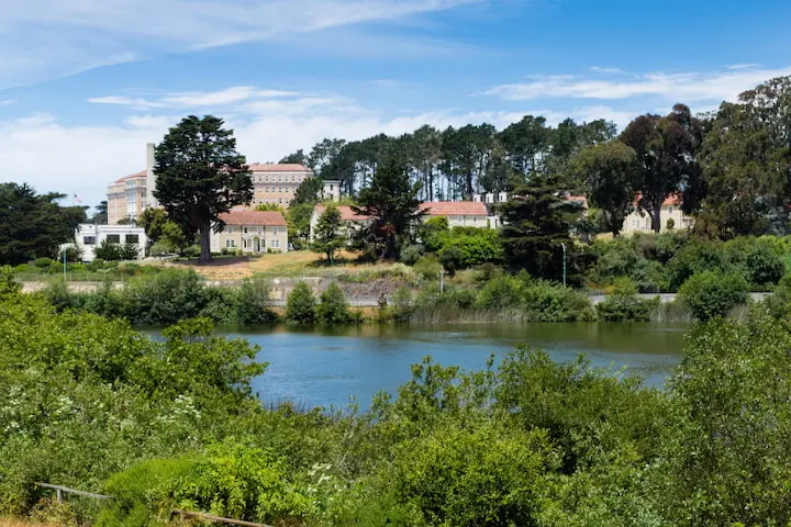 Mountain Lake, with houses visible in the background. Photo by Charity Vargas.