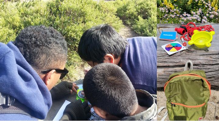 Three children use the tools inside an Explorer Backpack.