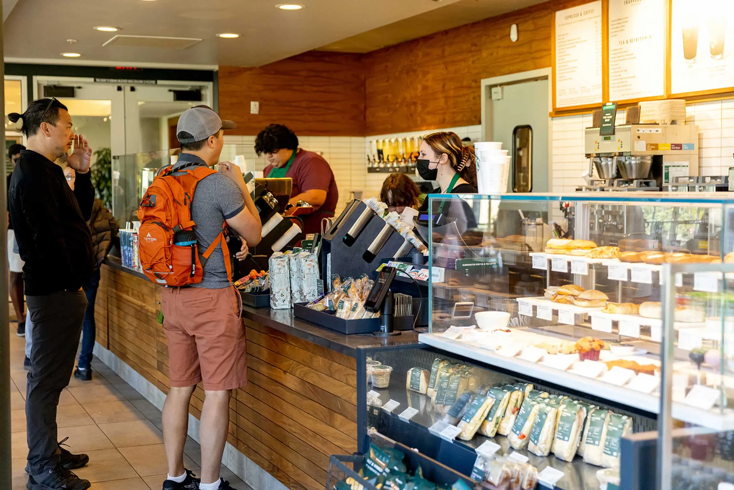 A customer ordering at Starbucks in the Presidio.