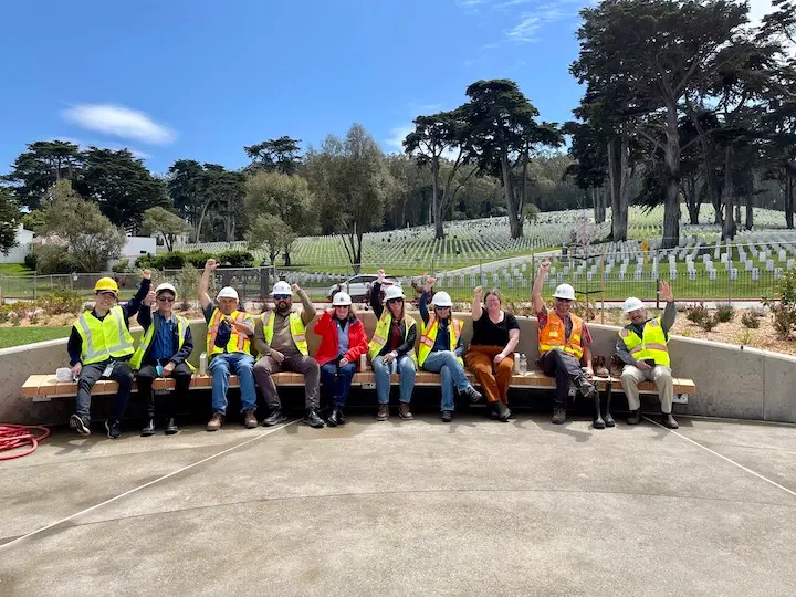 Presidio Trust staff members sitting on a bench at Battery Bluff.