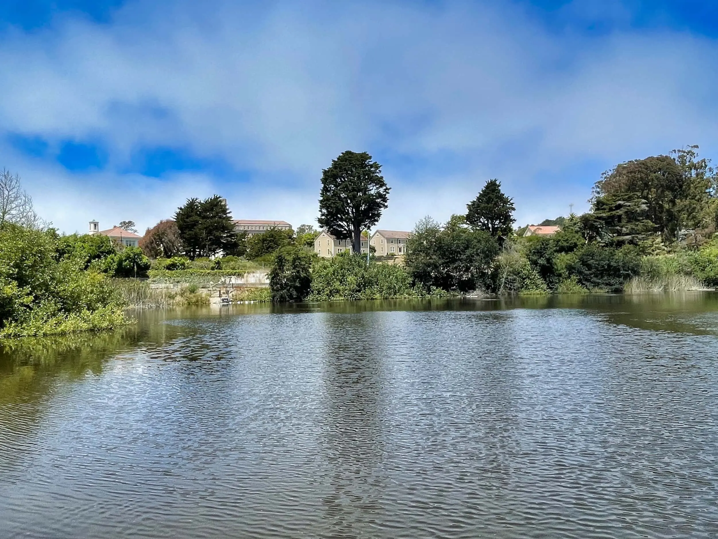 Mountain Lake, with homes and buildings from the Public Health Service District in the background.