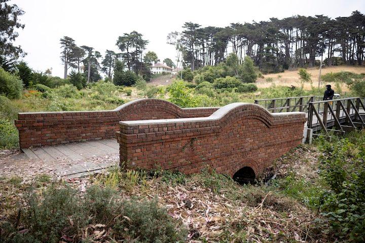 Historic brick bridge in MacArthur Meadow.