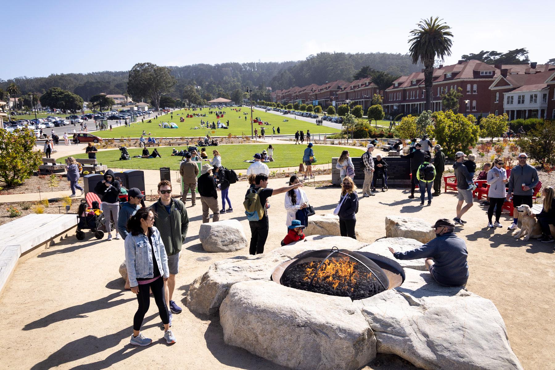 View of the Presidio’s Main Post looking south across the Main Parade Lawn, with visitors enjoying the park. Photo by Paul Myers.