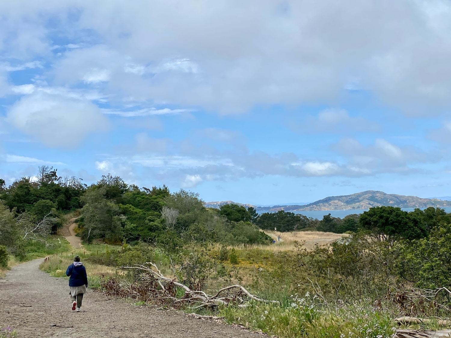 Woman walks on the Ecology Trail. Photo by Jesse Locks.