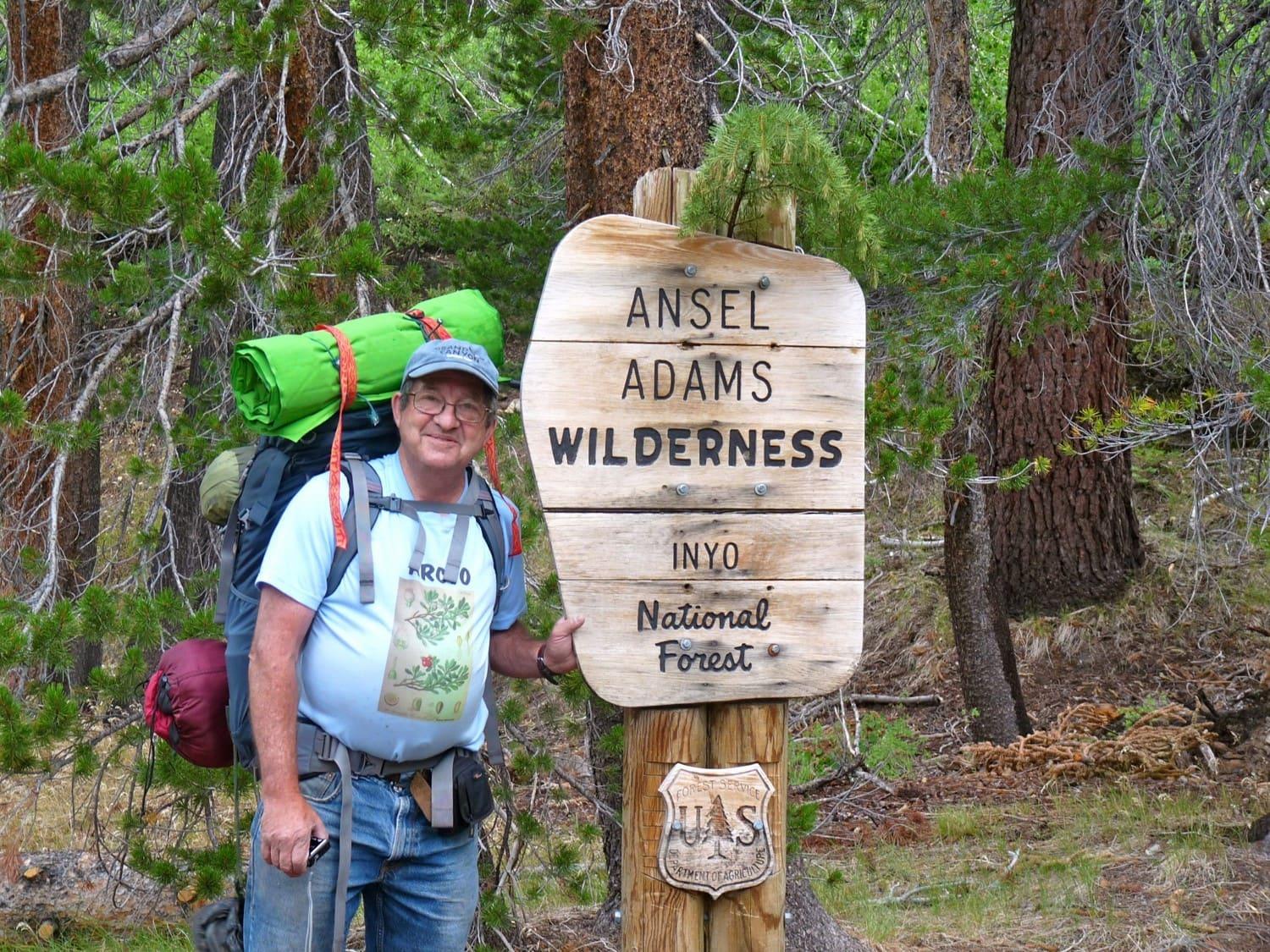 Peter traveling and hiking.