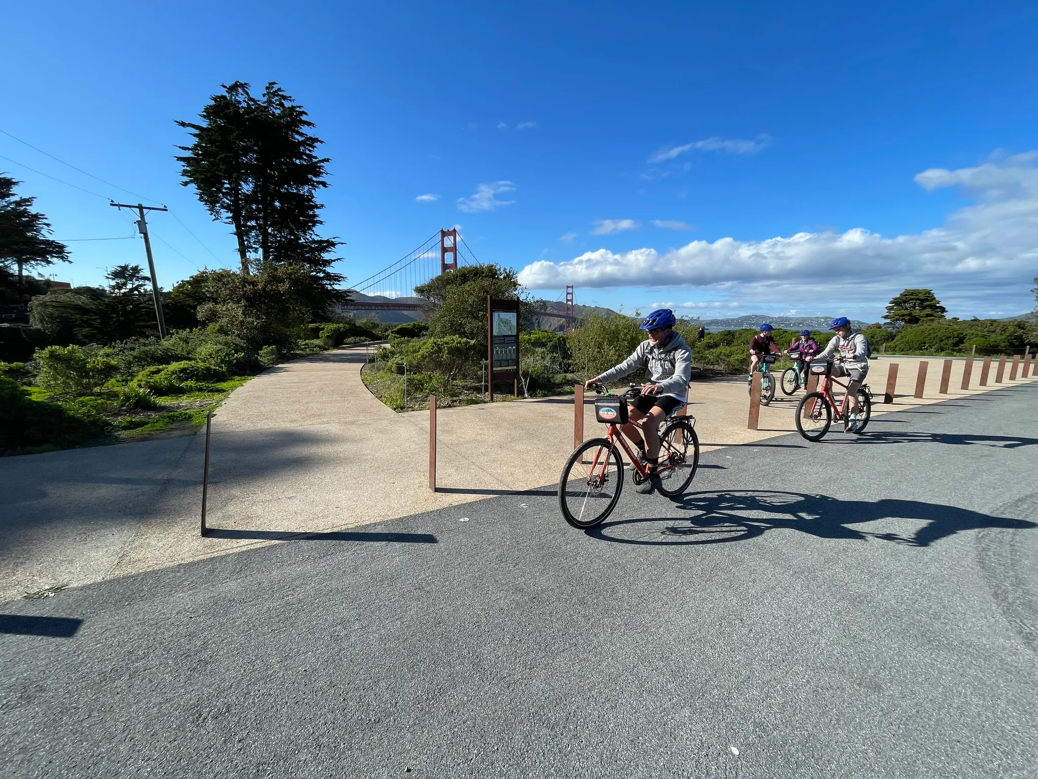 Family biking along Battery East Trail