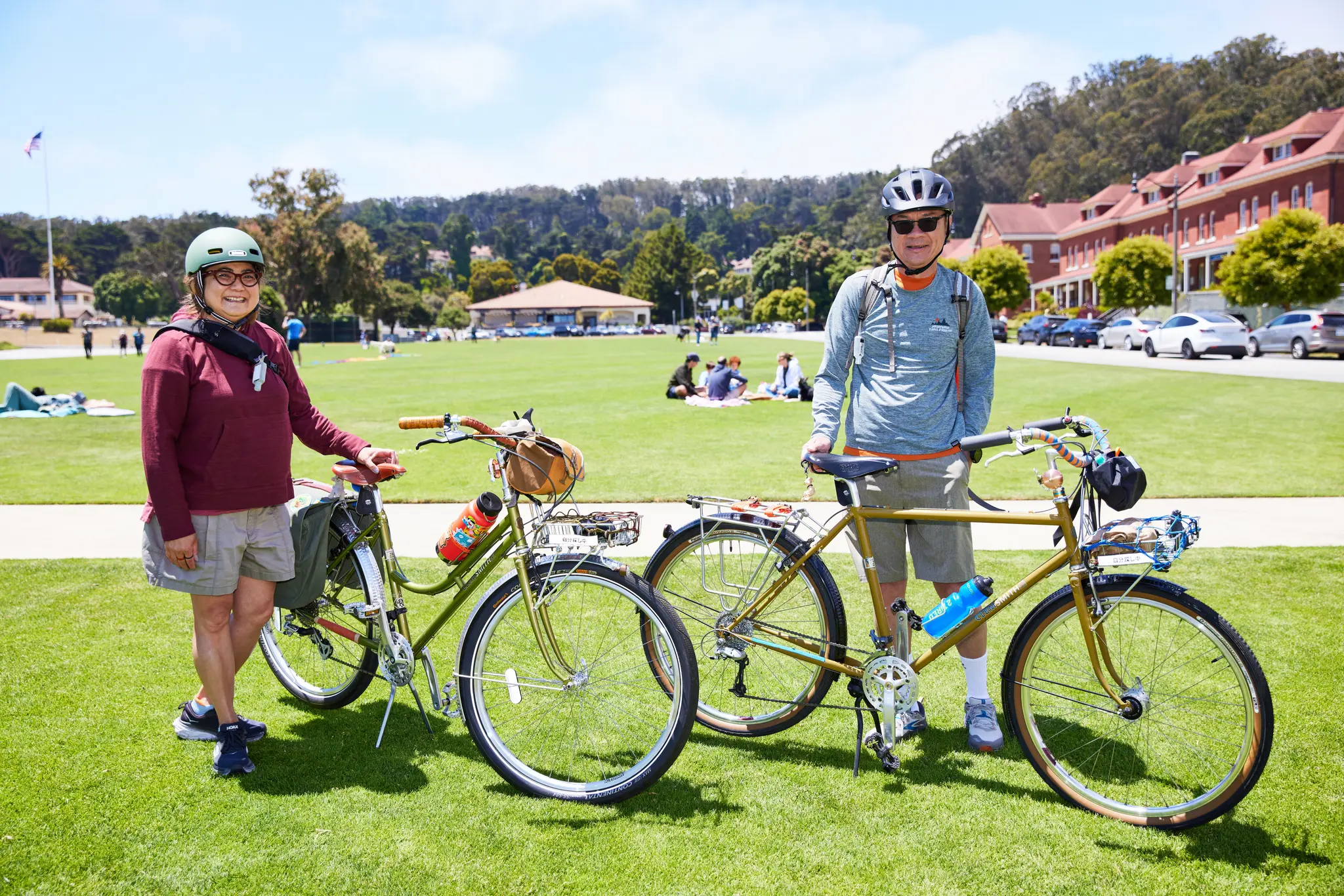 Couple with their bikes on the Presidio Main Parade Lawn