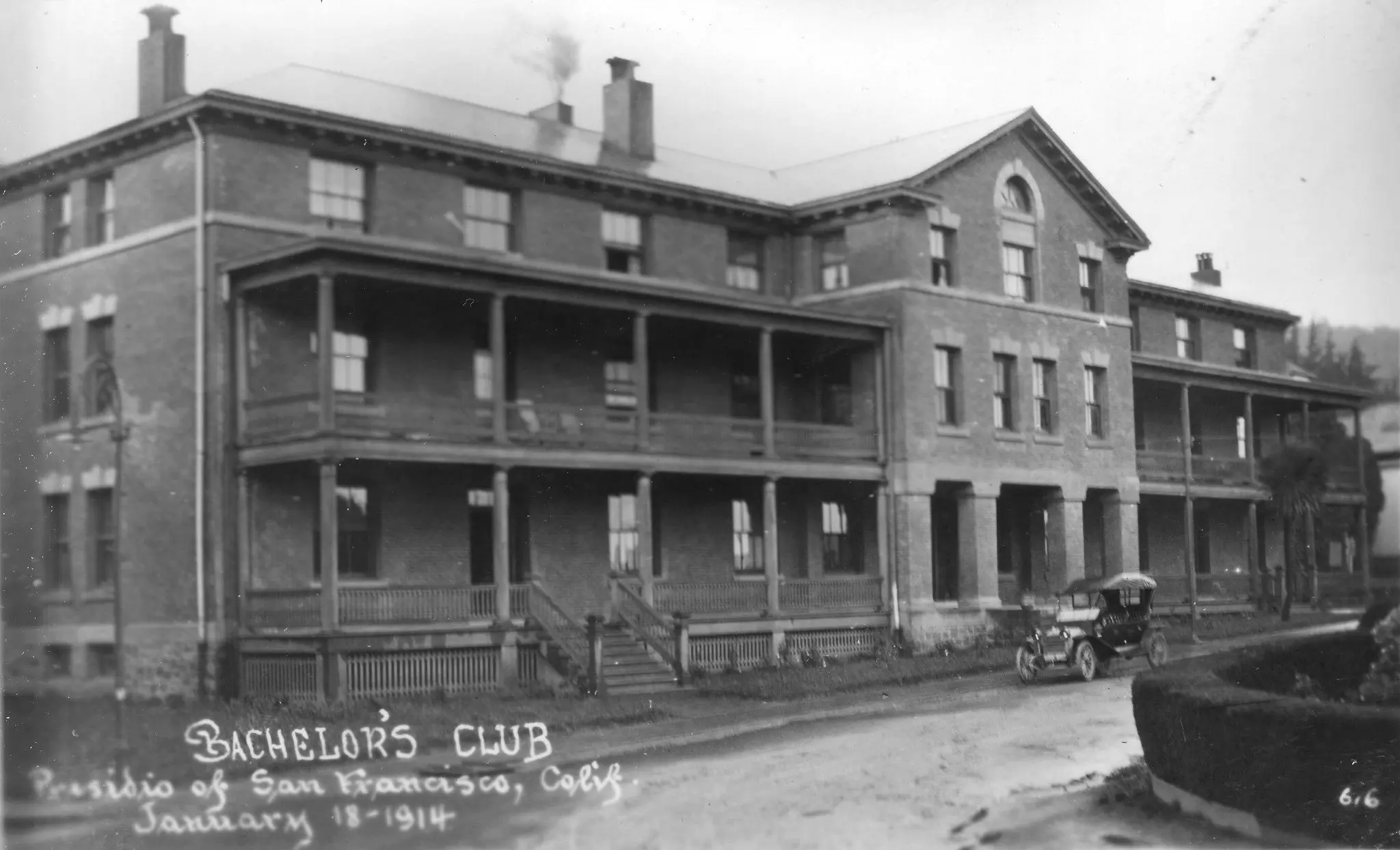 External black and white image of Presidio Inn (then Bachelor's Club) in 1914