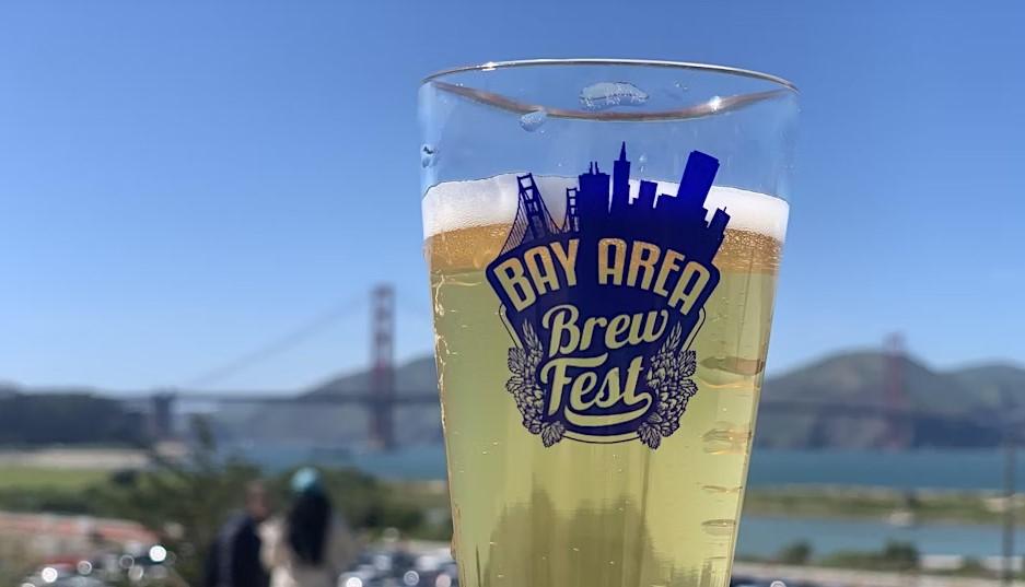 Glass with Beer in it saying Bay Area Brew Fest with the Golden Gate Bridge in the background