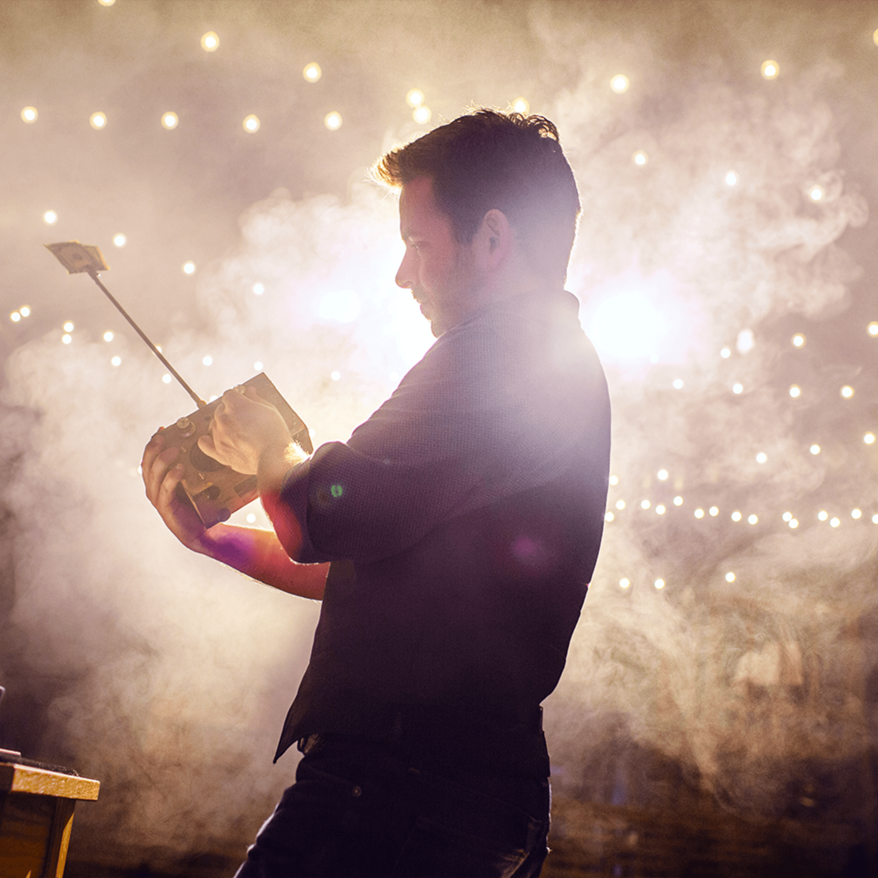 Man performing magic on a stage