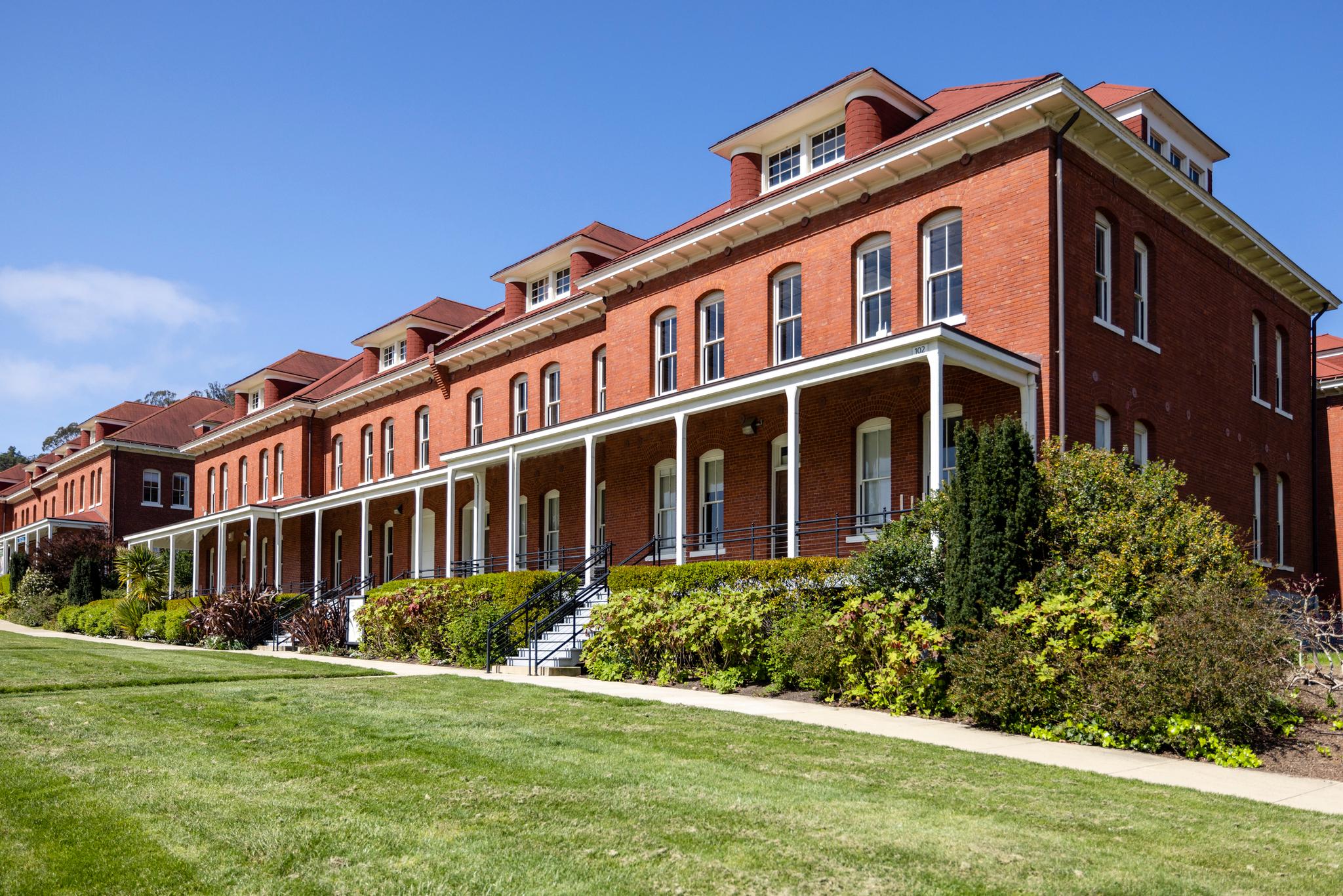 external shot of red brick offices on Montgomery Street.