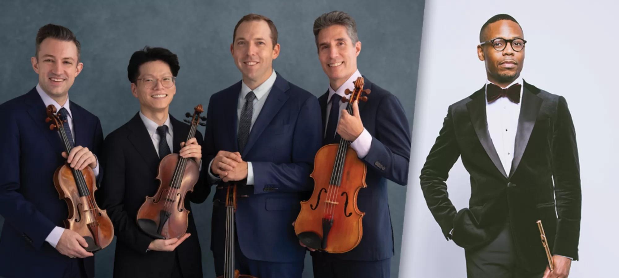 group of 5 band members standing with their instruments