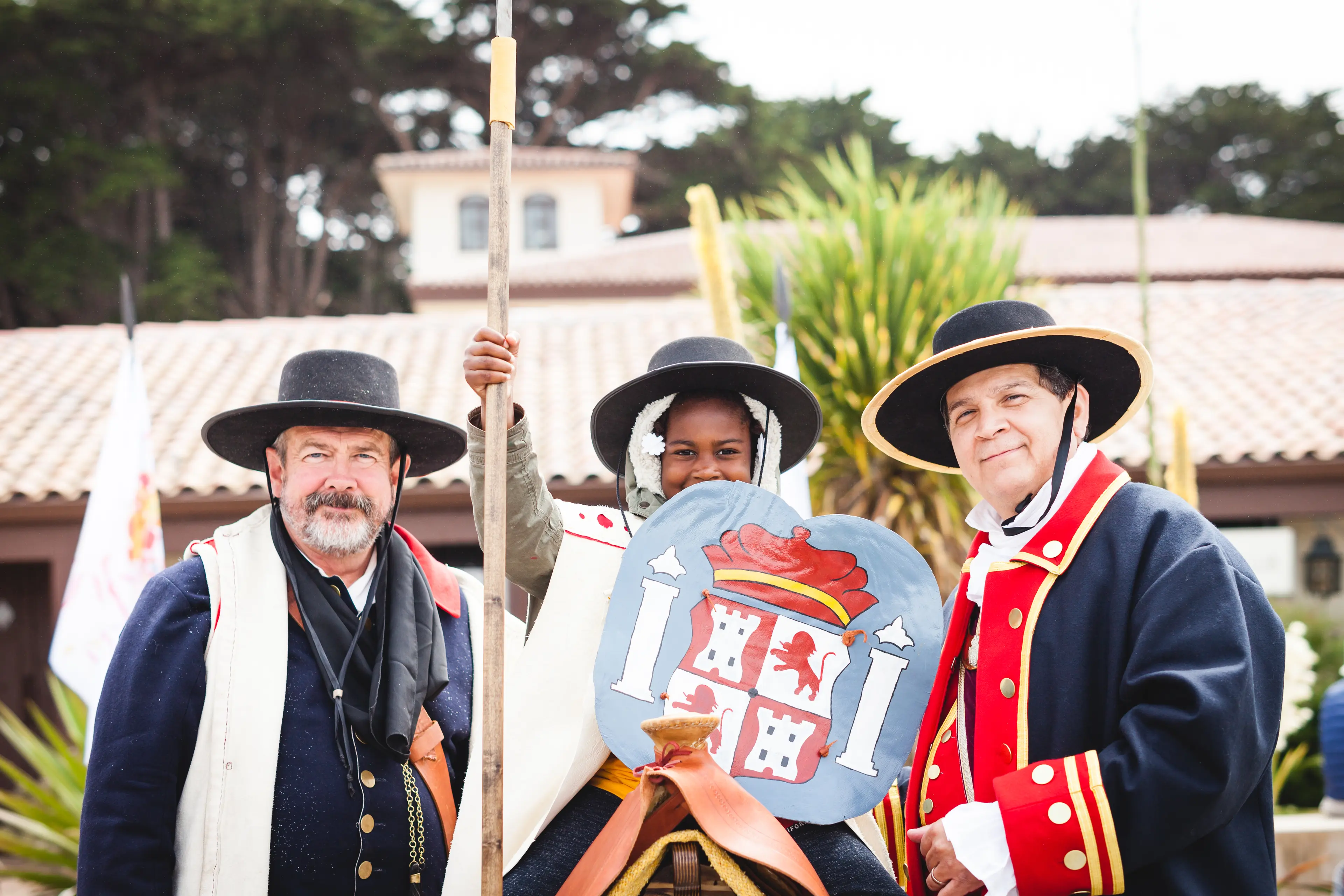 Group of 3 people dressed up in 16th century attire