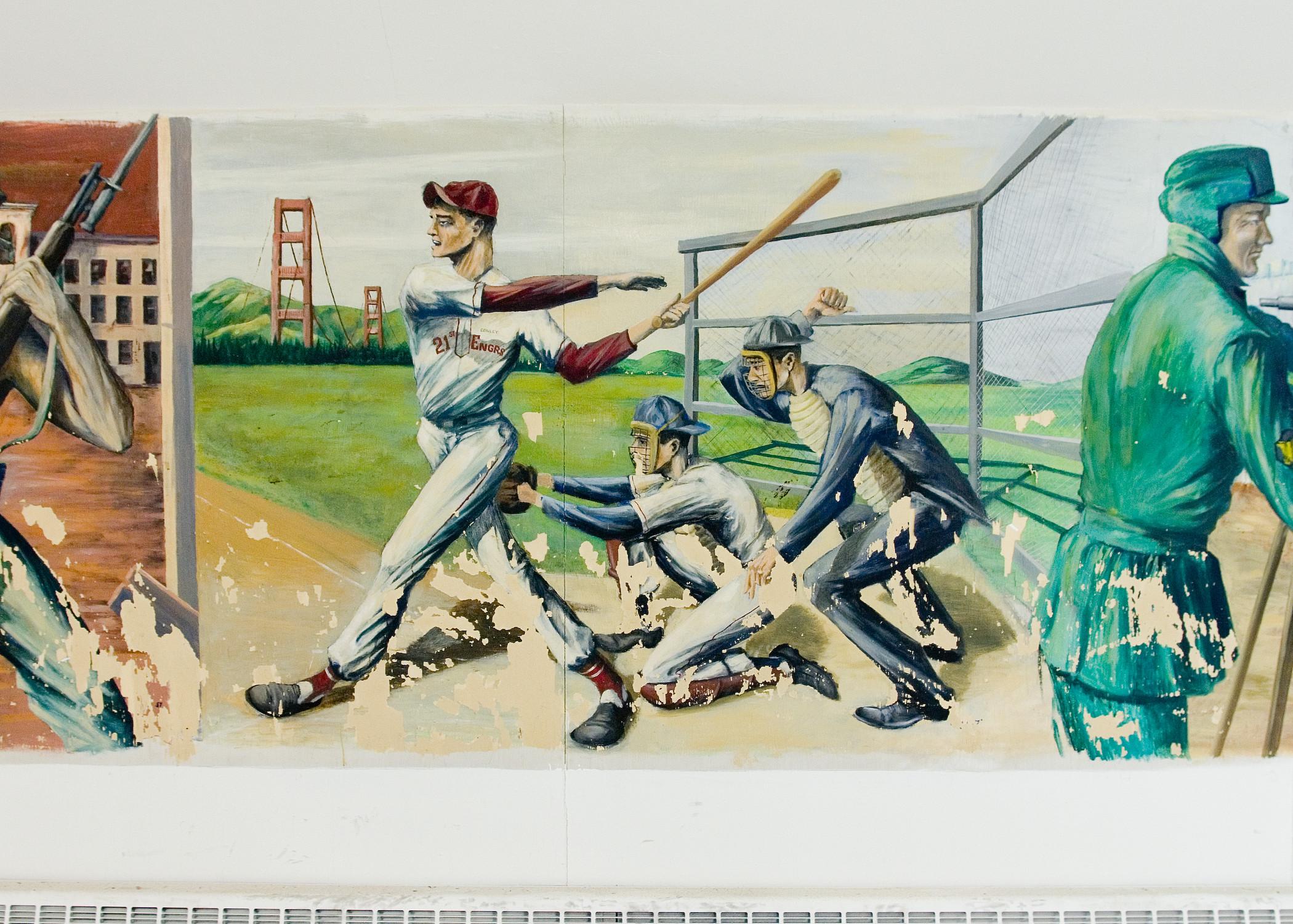Mural of Baseball players batting on field with Golden Gate Bridge in the background