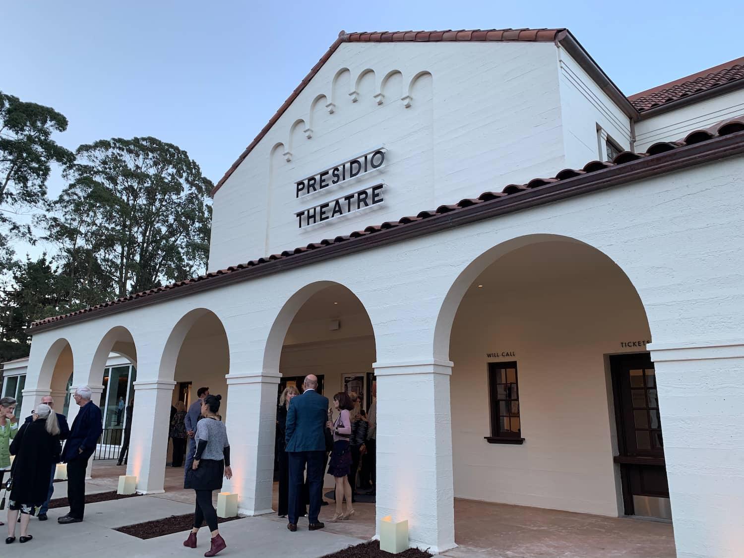 Presidio Theatre in the Presidio of San Francisco, with people standing in front.