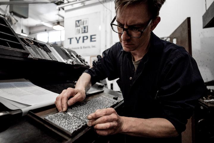 A man working with type at Arion Press. Photo courtesy of Arion Press.