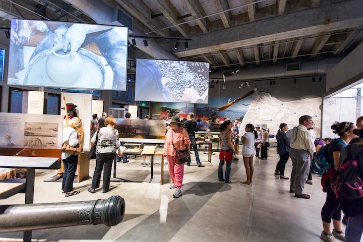 Crowd enjoys exhibits inside the Presidio Heritage Gallery.