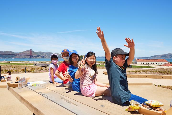   Five kids on a bench at Presidio Tunnel Tops. Photo by Rachel Styer.
