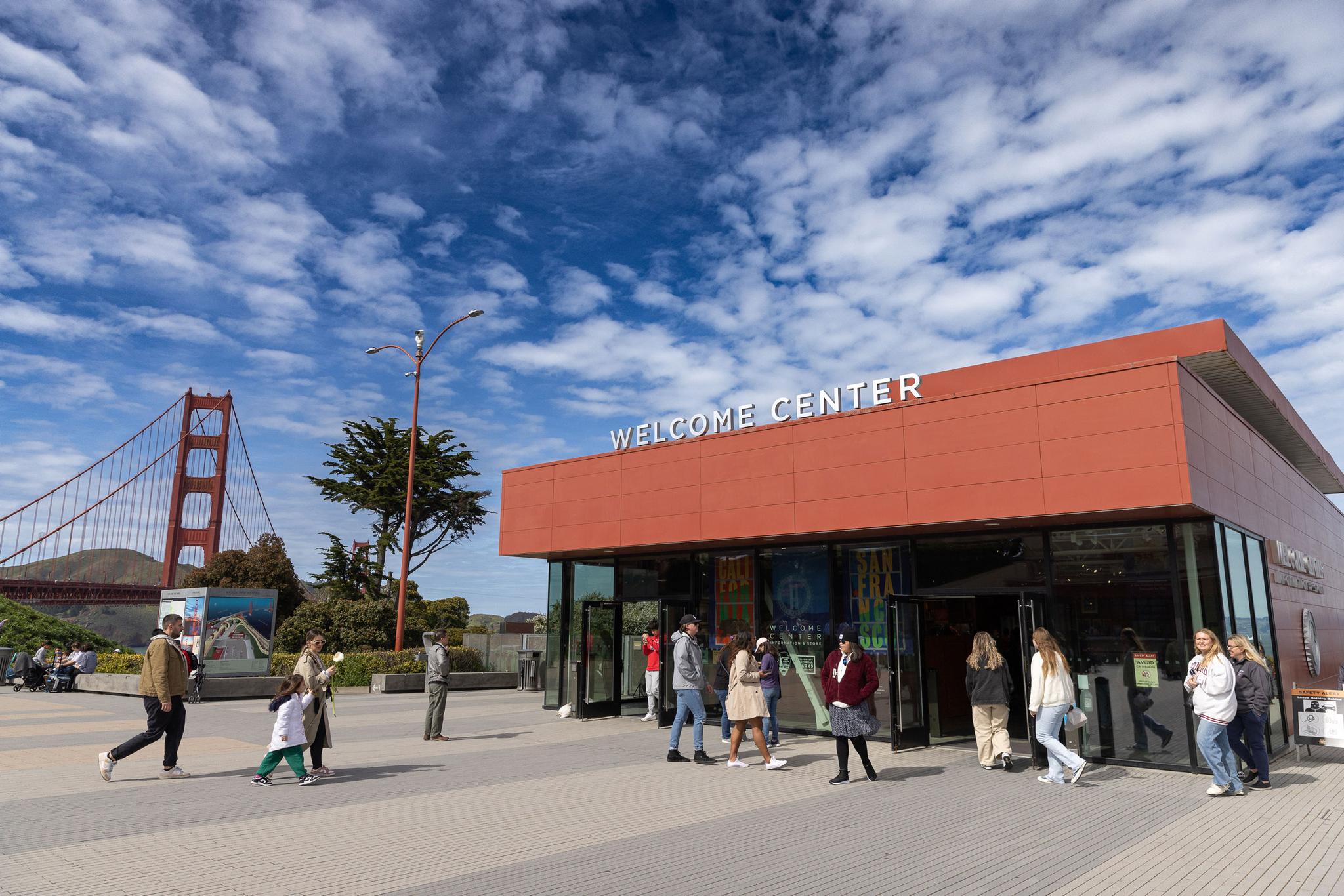 Visitors entering the Golden Gate Bridge Welcome Center in the Presidio. Photo by Myleen Hollero.