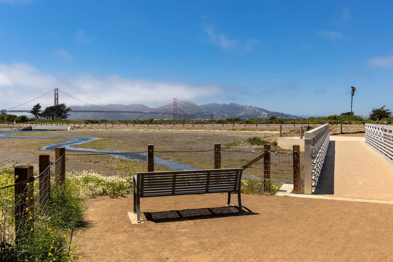 Quartermaster Reach Marsh in the Presidio with a bench and pedestrian bridge. Photo by Charity Vargas.