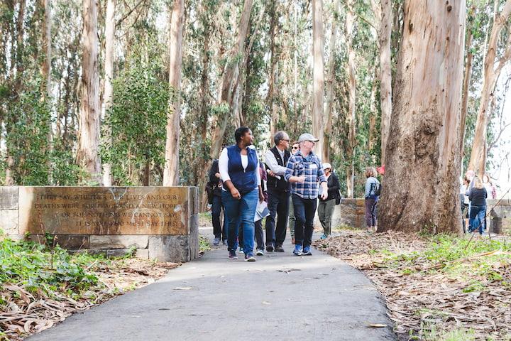 Visitors walk on the pathway that runs through National Cemetery Overlook.
