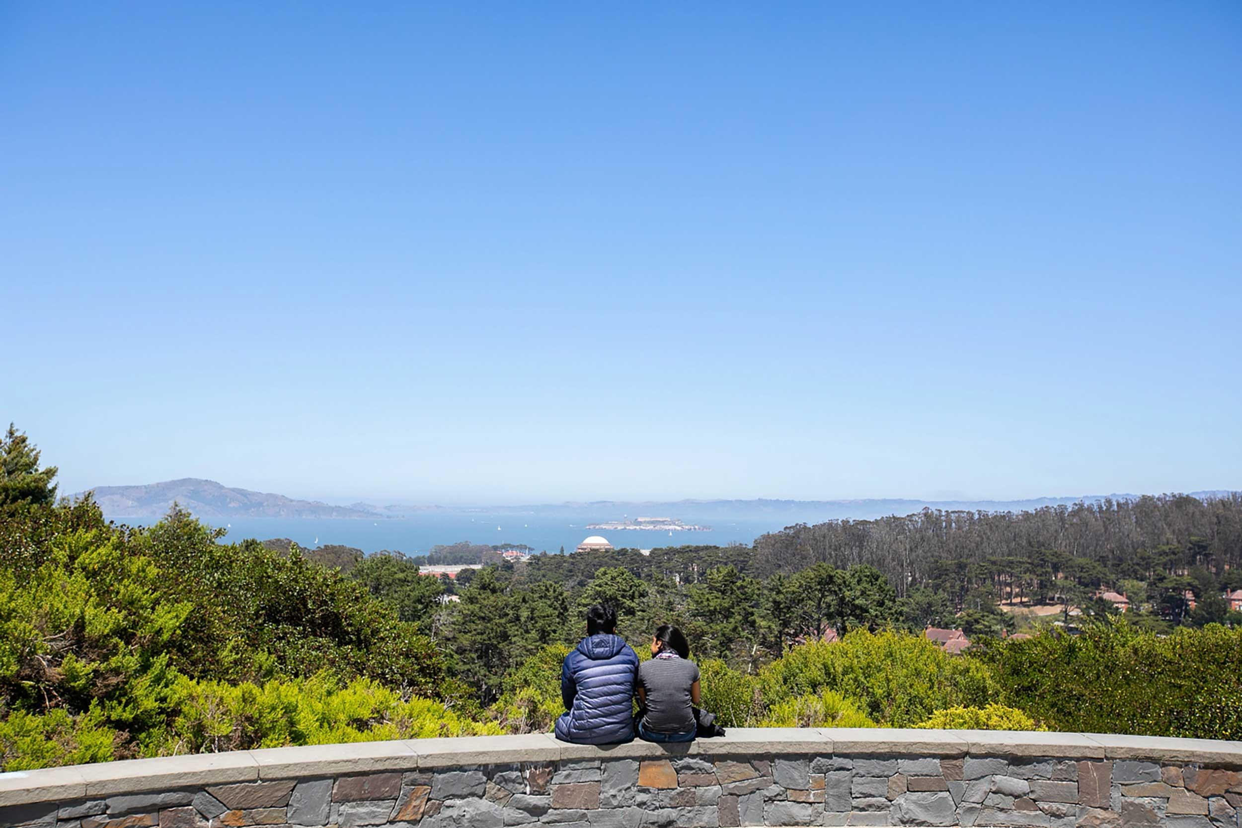 Two people taking in the view at Inspiration Point.