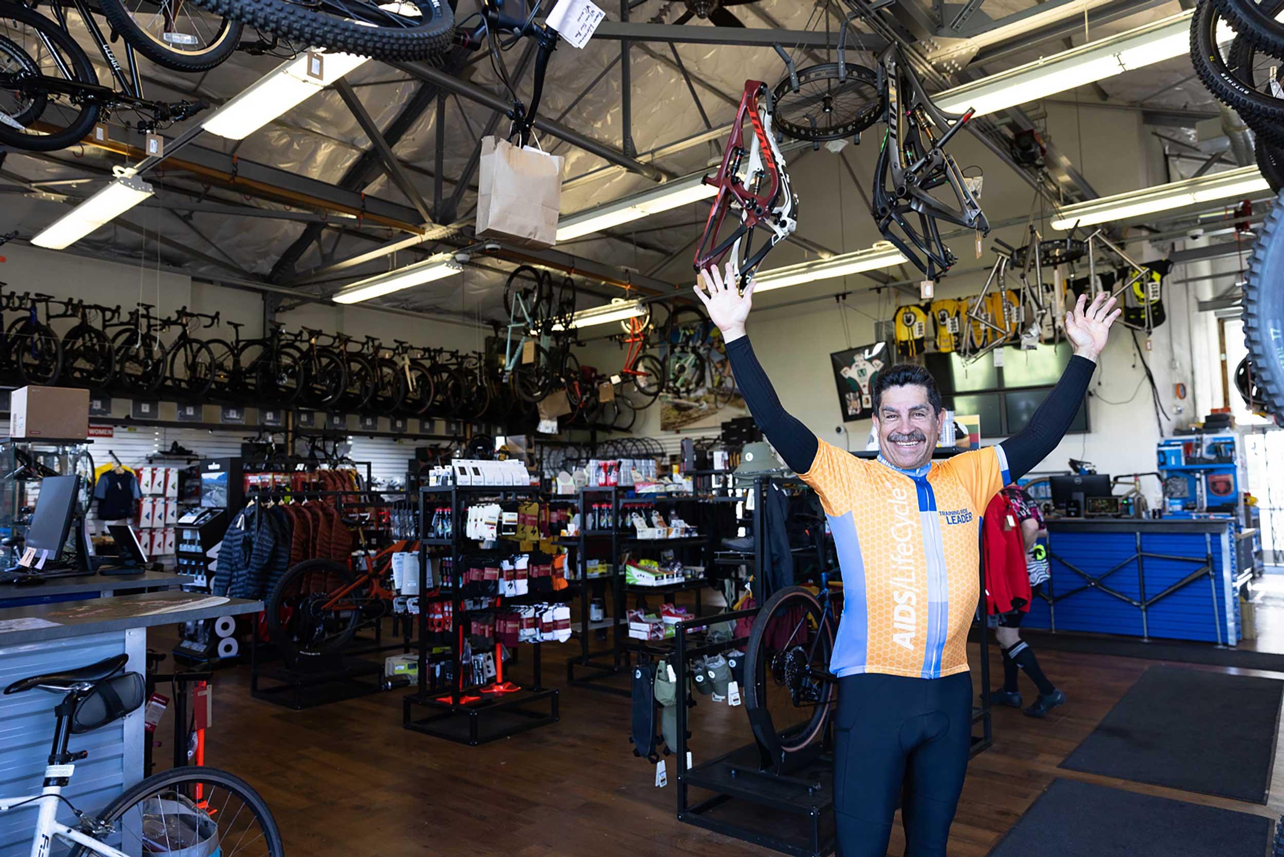 Man standing inside Roaring Mouse Cycles at Crissy Field. Photo by Myleen Hollero.