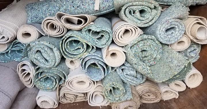 Used carpet sorted for recycling.