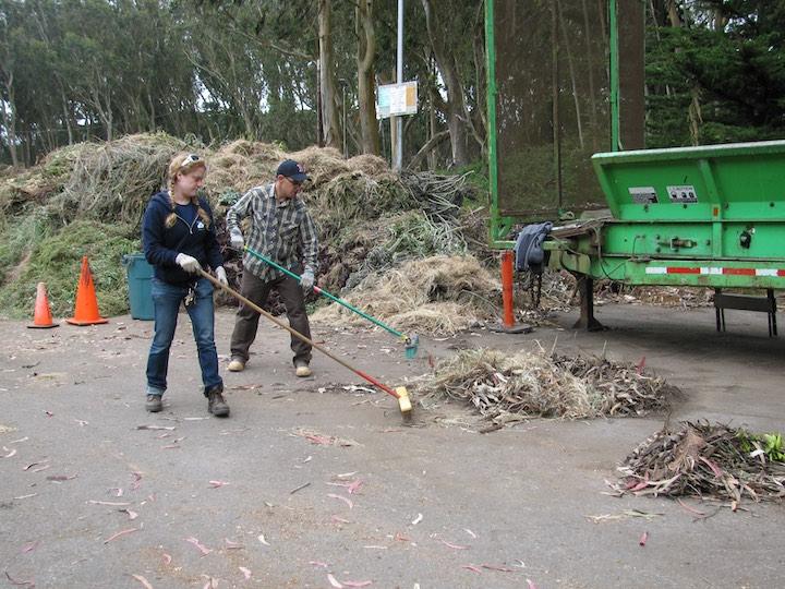 Two Presidio Trust staff members at the compost yard.