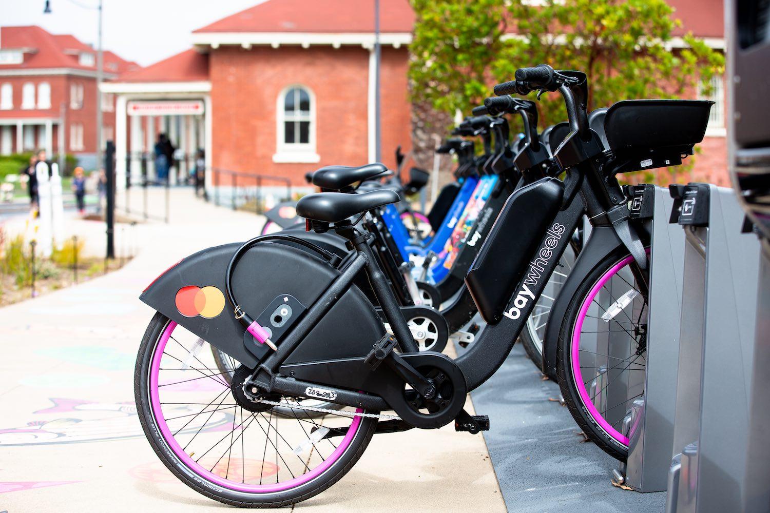 A row of Bay Wheels bike next to Presidio Transit Center. Photo by Myleen Hollero.