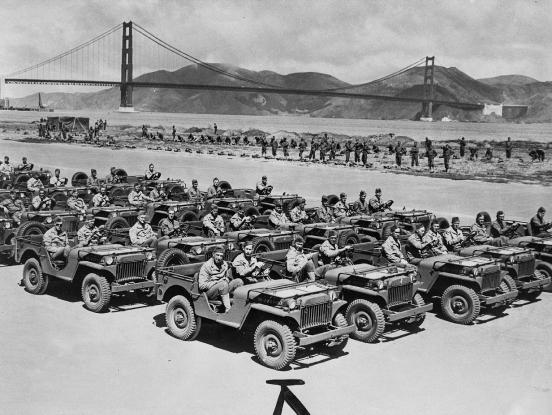 Image of US military troops in front of the Golden Gate Bridge.