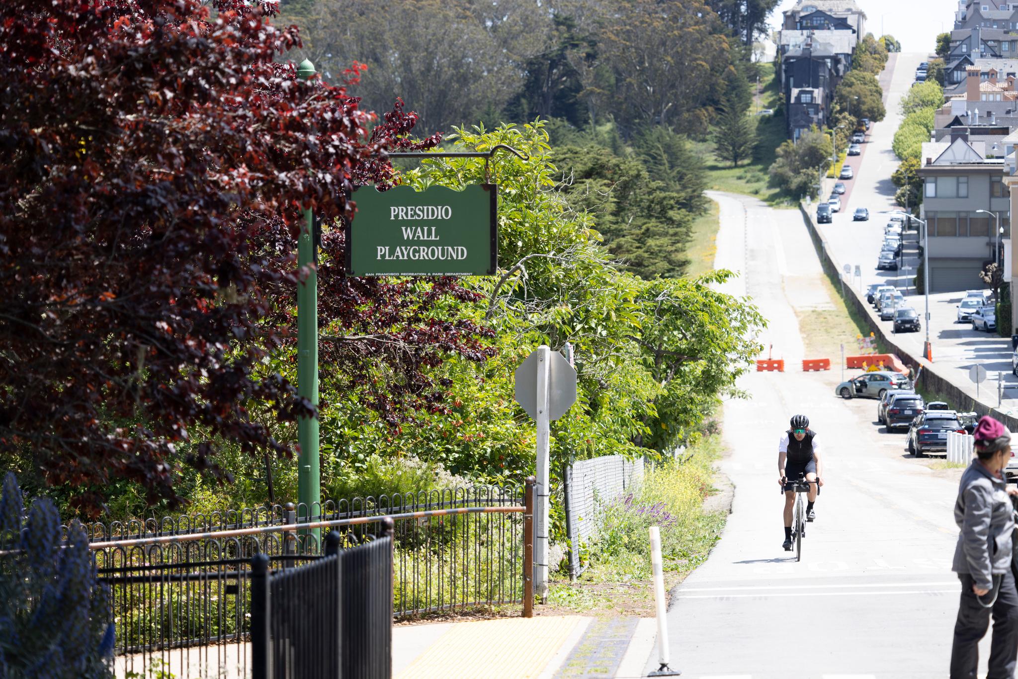 A bicyclists rides down West Pacific Avenue, one of the Presidio Slow Streets. Photo by Paul Myers.