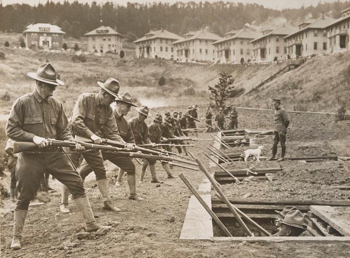 Men drilling with bayonets on rifles. Image courtesy of NARA.
