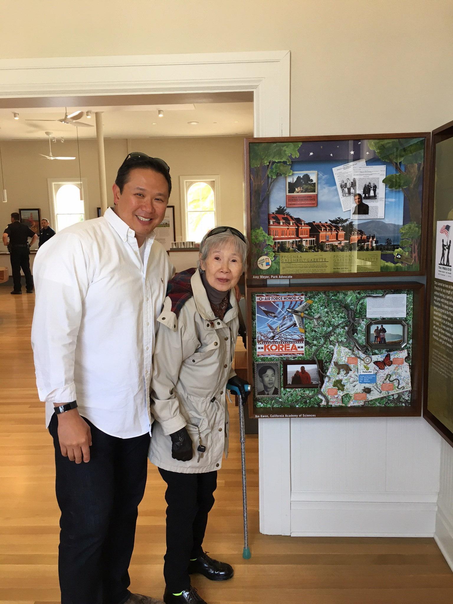 Ike Kown and his mother with his shadow box at the Visitor Cetner.
