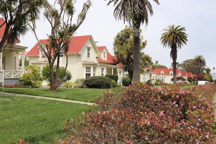 White historic homes with red roofs on Funston Avenue in the Presidio.