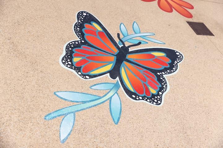 Butterfly ground mural by artist Felicia Gabaldon.