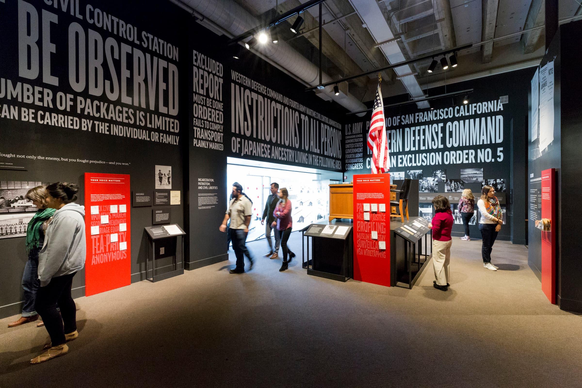 Many visitors explore the EXCLUSION Exhibition in the Presidio. Photo by Charity Vargas.