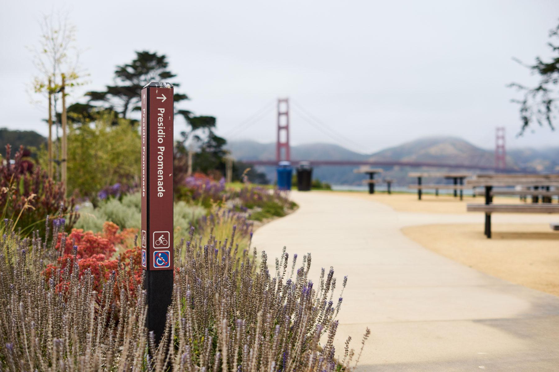 Paved Presidio Promenade trail as it passes through the picnic area at Battery Bluff.