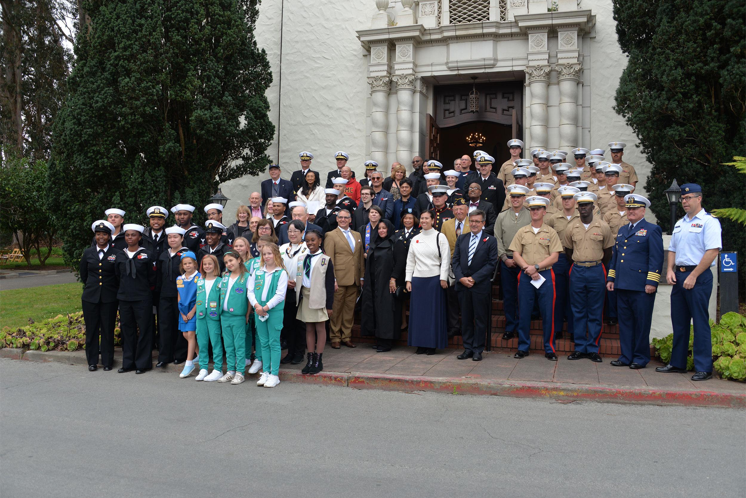 Fleet group photo in front of Interfaith Center